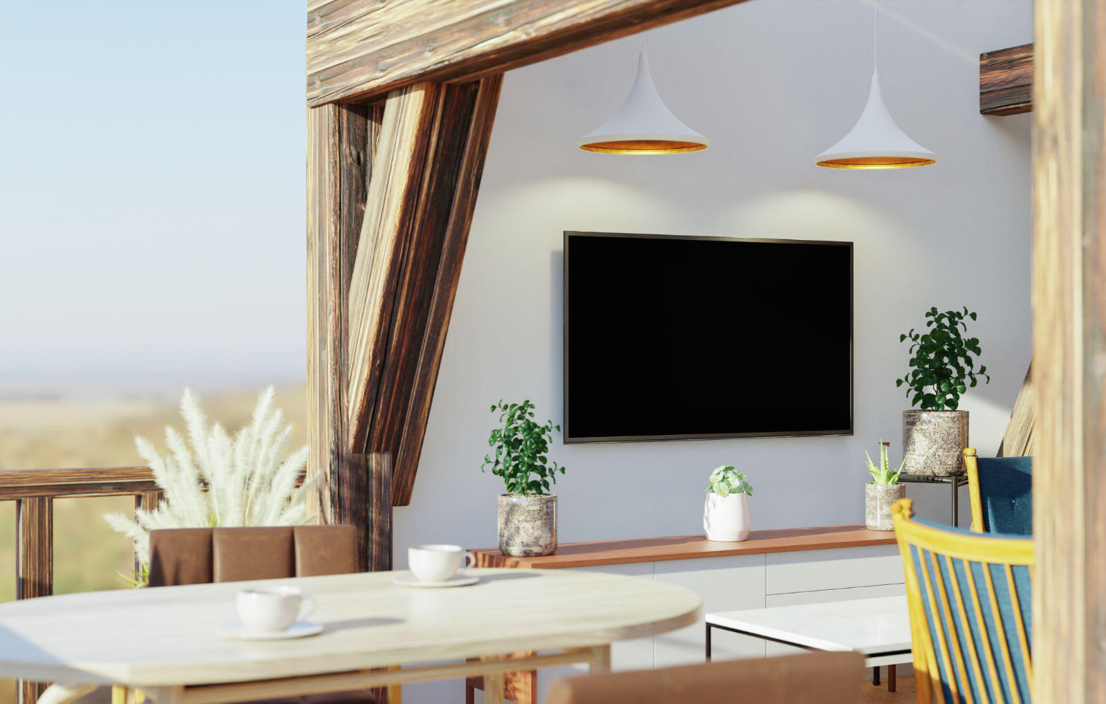 A modern, sleek weatherproof TV mounted on a white wall of a covered luxury patio with a wooden beam and hanging pendant lights.