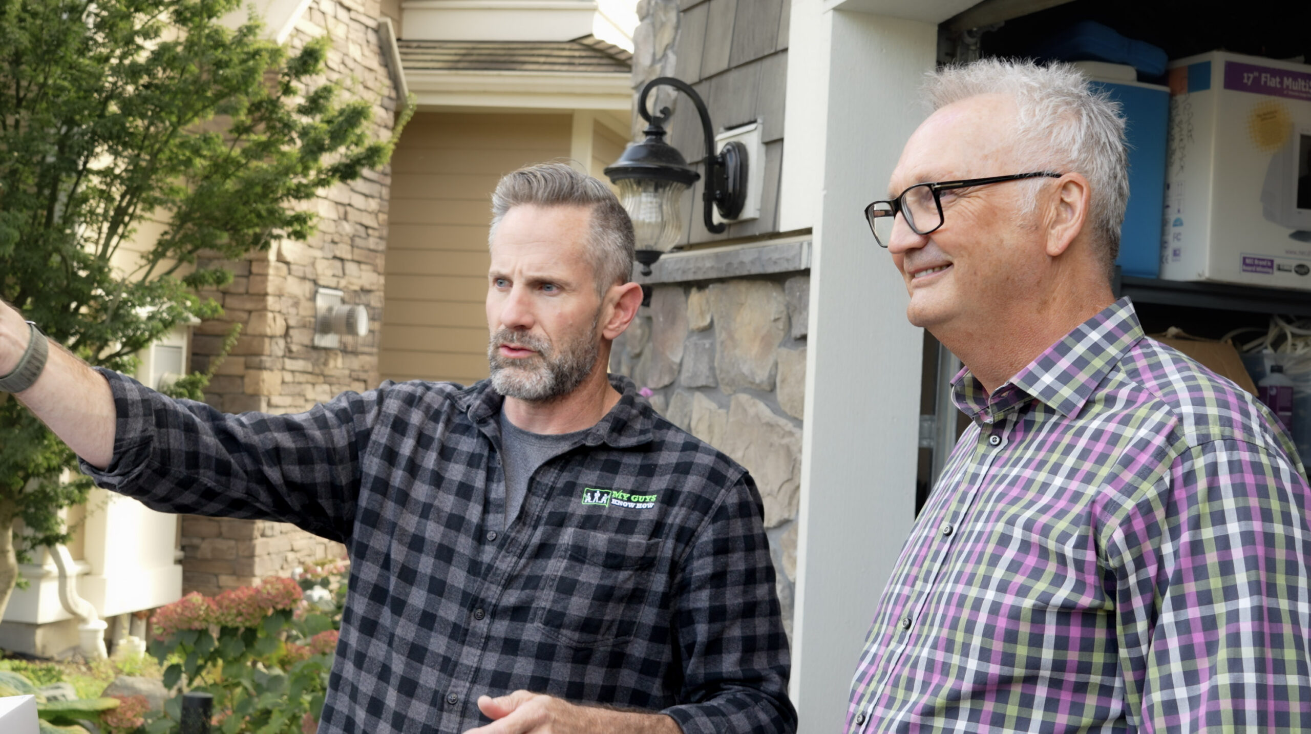 Bryan Talking to a client  outside by the garage<br />
